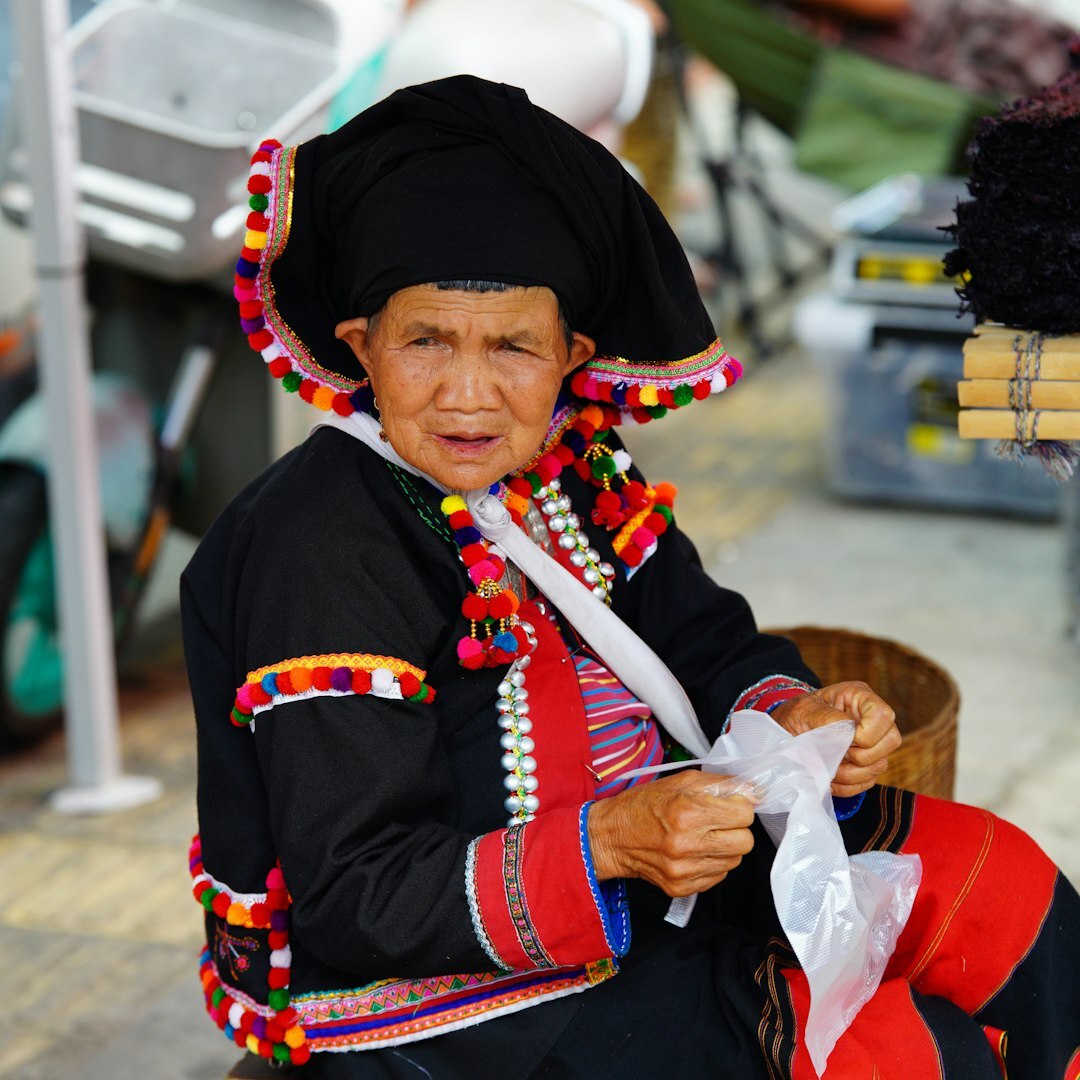 Elderly Croatian woman making traditional lace at home